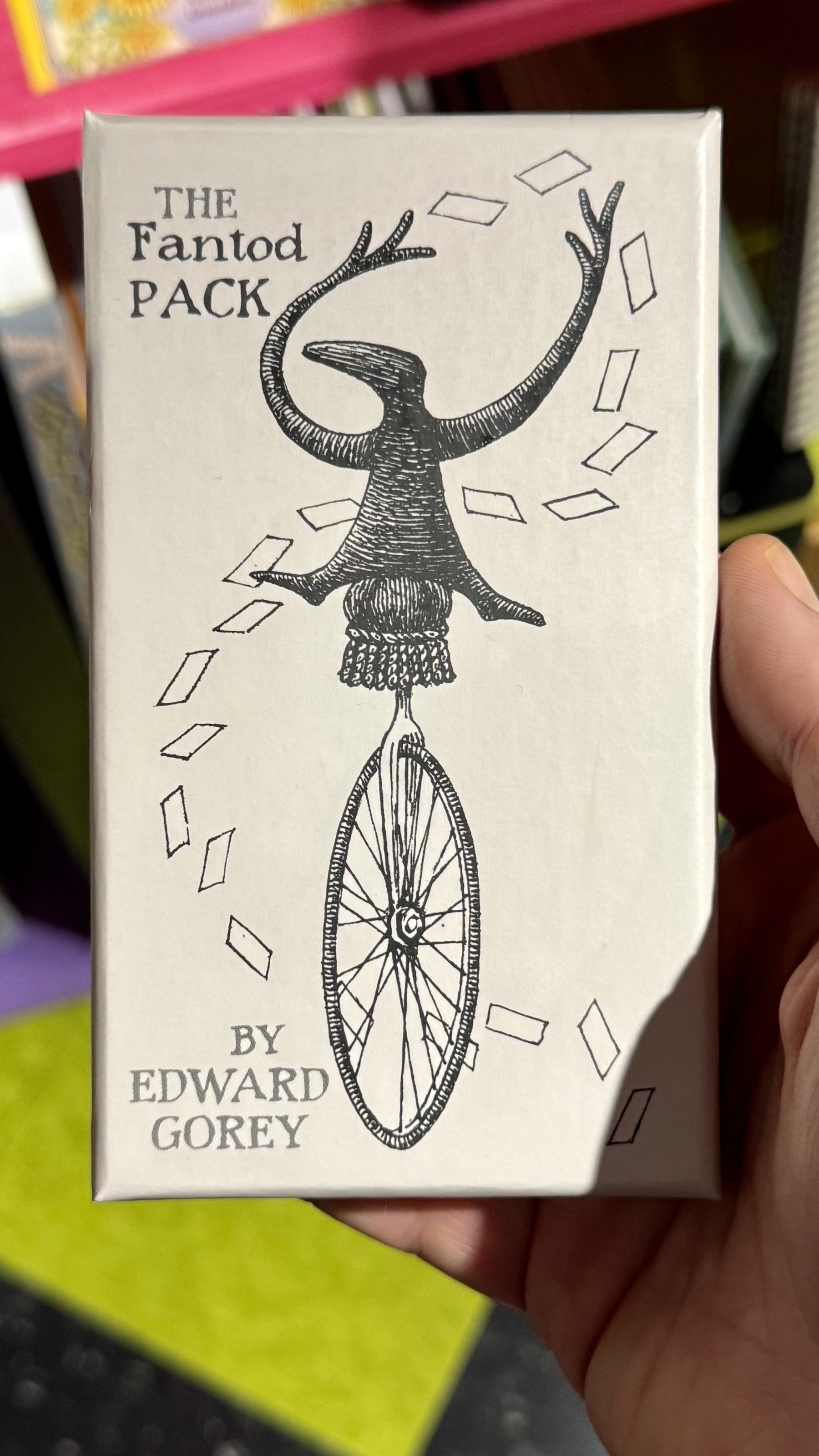 A hand-drawn Fantod pack by Edward Gorey features a cyclops with a wheel and text.
