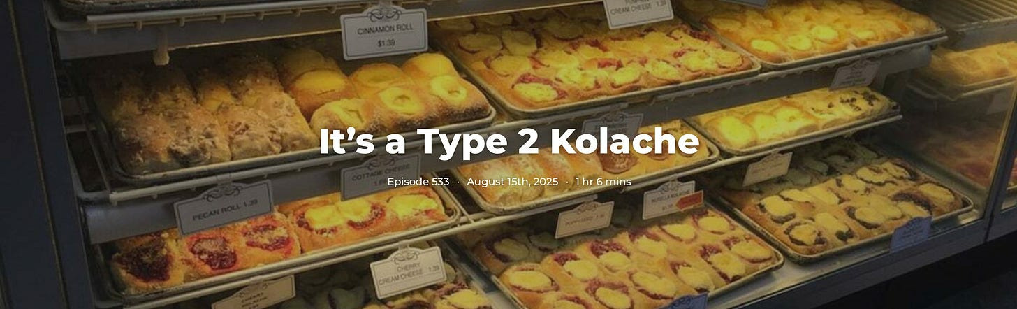 A display case contains assorted kolaches, including pecan, cream cheese, and cherry varieties with prices.