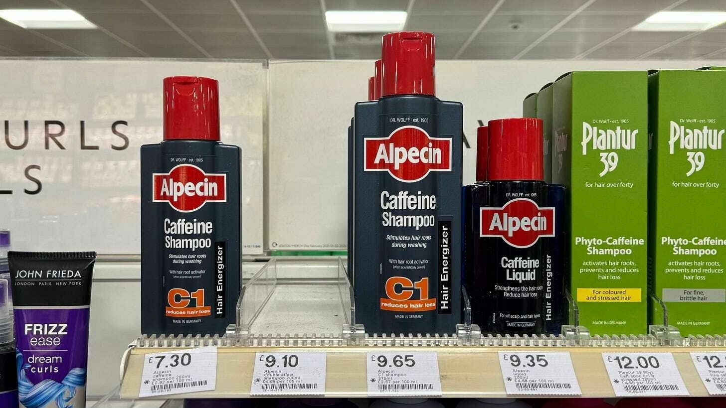 Alpecin Caffeine Liquid and Phyto-Caffeine Shampoo bottles are displayed, promoting hair root activation and reduction.