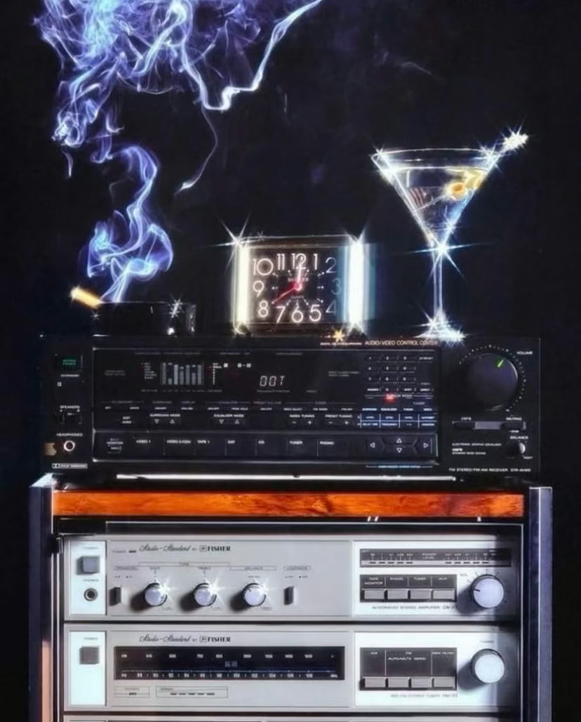 A vintage Fisher stereo amplifier with a display showing numbers and controls, surrounded by smoke.