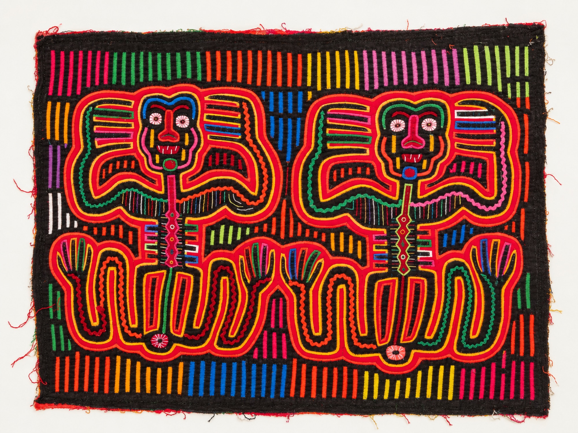 Symmetrical textile panel showing two stylized figures with wide eyes and visible ribcages seated side by side.