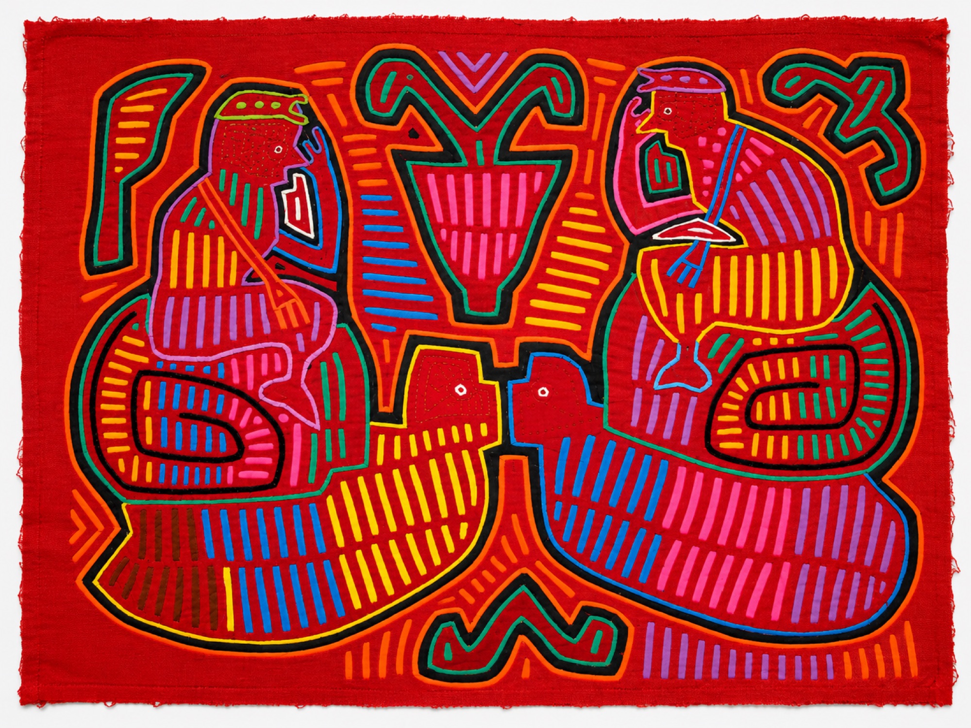 Symmetrical red textile panel showing two seated figures perched on large birds facing each other beside a central vase.